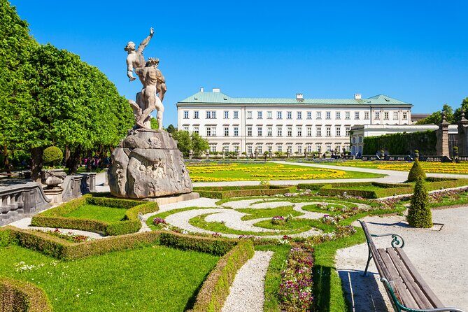 Salzburg Old Town Walking Tour, Mozart, Mirabell Gardens - Collegiate Church facade and Salzburg Cathedral: baroque scale, plus what to watch for